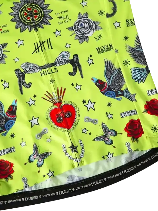 Vibrant neon green cycling jersey with tattoo-style graphics, roses, birds, and stars for men and women riders.