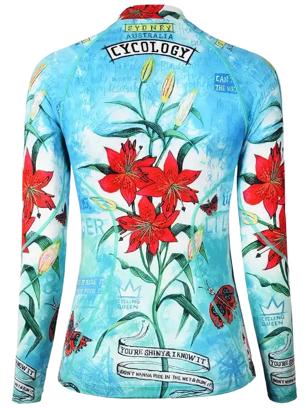 Women's long sleeve cycling jersey with red lily print, 'Cycology' logo, and cycling-themed graphics on blue background