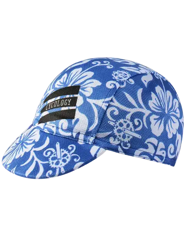 Blue floral cycling cap with white hibiscus print and black logo patch for men and women