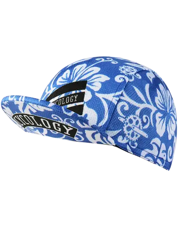 Blue and white floral cycling cap with 'Cycology' logo, ideal for bike rides and outdoor sports.