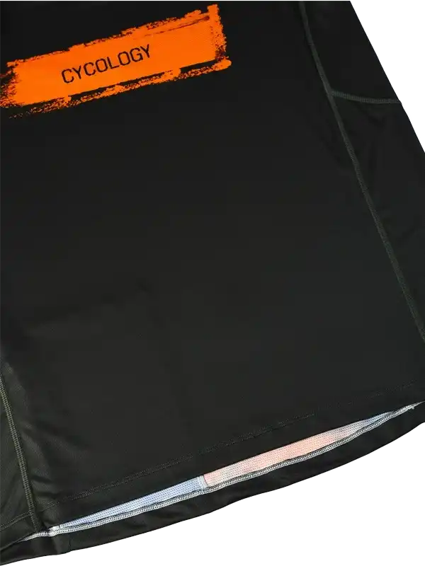 Black cycling jersey with orange CYCOLOGY logo, high-quality fabric, and reflective hem detail