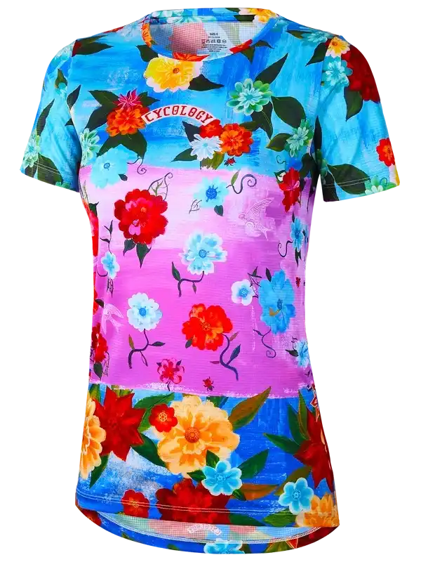 Women's floral cycling jersey with vibrant blue and pink print, short sleeves, and performance fabric.