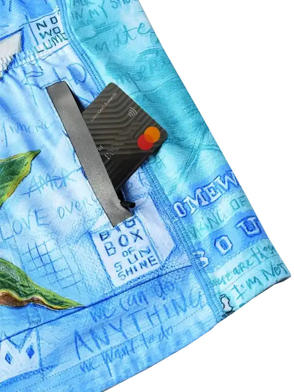 Blue cycling shorts with artistic print and secure card pocket for on-the-go convenience