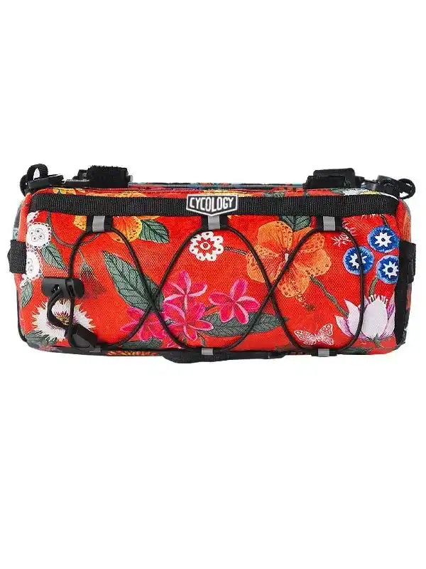 Vibrant floral cycling frame bag with black straps and Cycology logo, ideal for bike adventures.