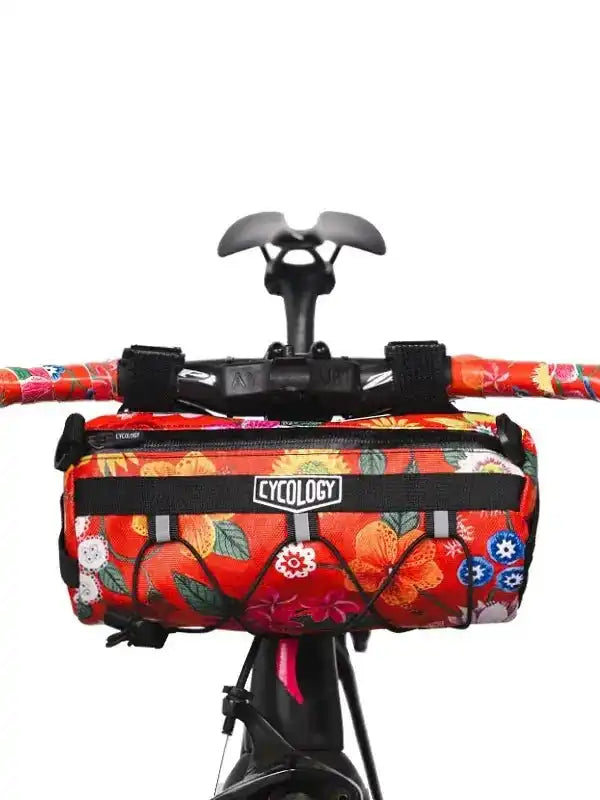 Cycology floral bike handlebar bag with vibrant red pattern, perfect for cycling adventures