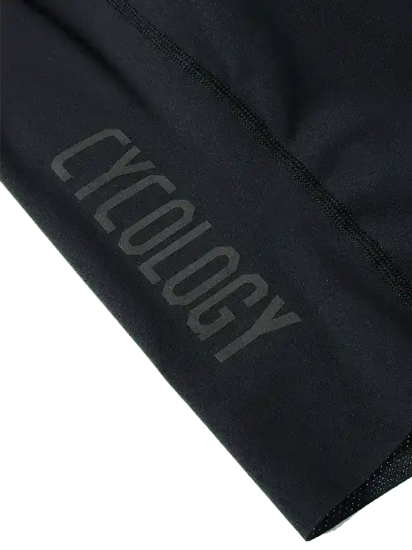 Black cycling shorts with subtle Cycology logo, high-quality fabric detail