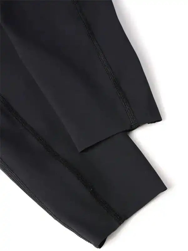 Black cycling tights with flatlock seams for comfort and performance