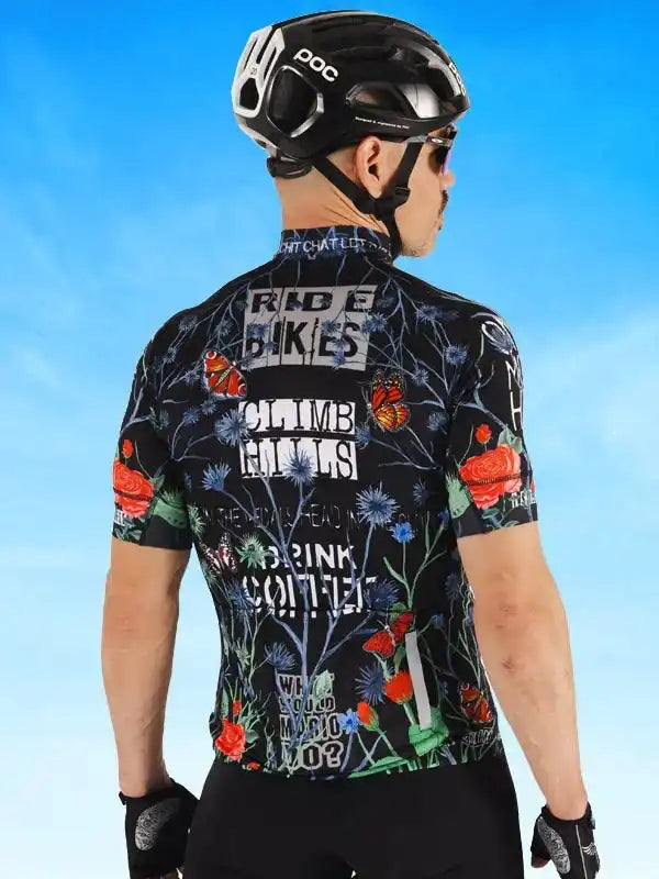 Men's cycling jersey with floral print and bold text, worn with POC helmet and gloves for road biking