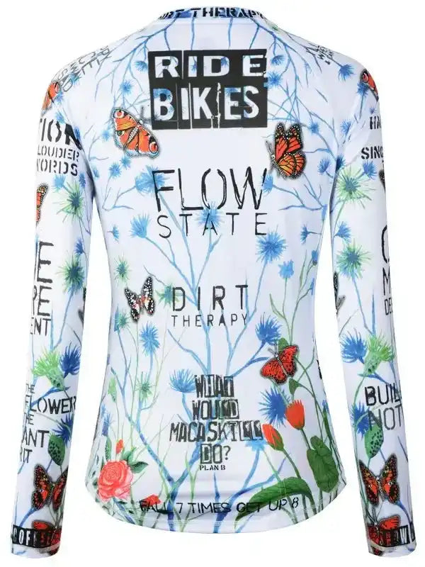 Women's cycling jersey with butterfly and floral print, 'Ride Bikes' and 'Flow State' text, long sleeve design