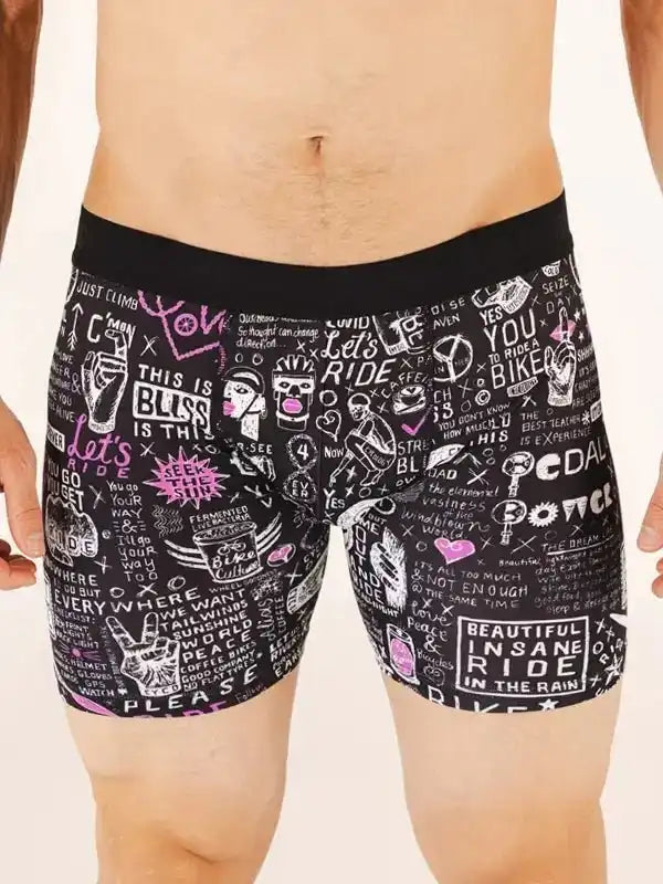 Men's cycling shorts with bold graphic print, featuring cycling phrases and designs for active riders.
