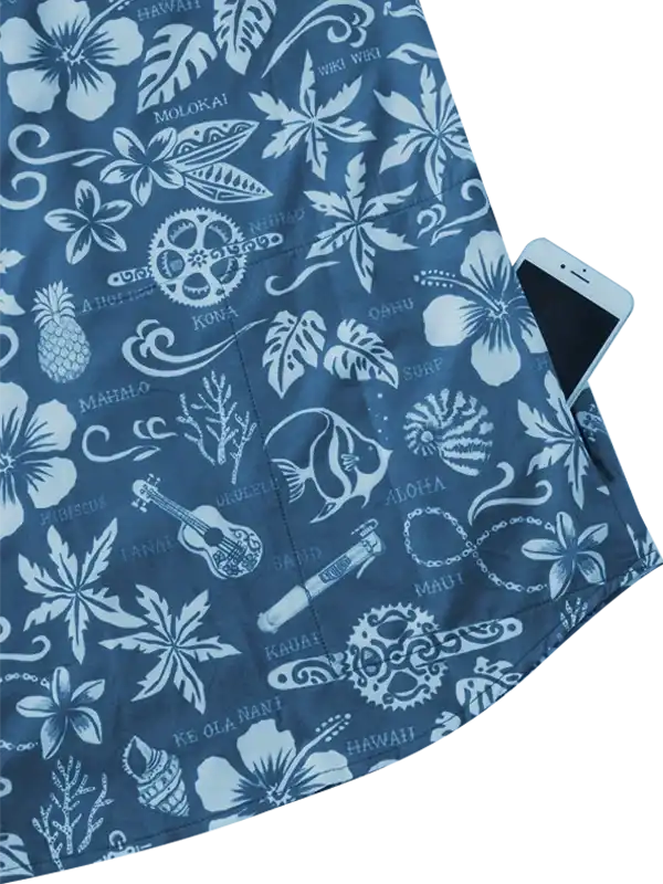 Blue Hawaiian-themed cycling shorts with floral, fish, and ukulele print, featuring side pocket holding phone