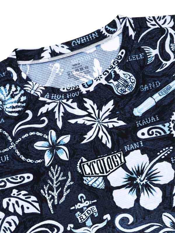 Black cycling jersey with tropical floral and surf graphics, featuring 'Cycology' logo and Hawaii-inspired designs