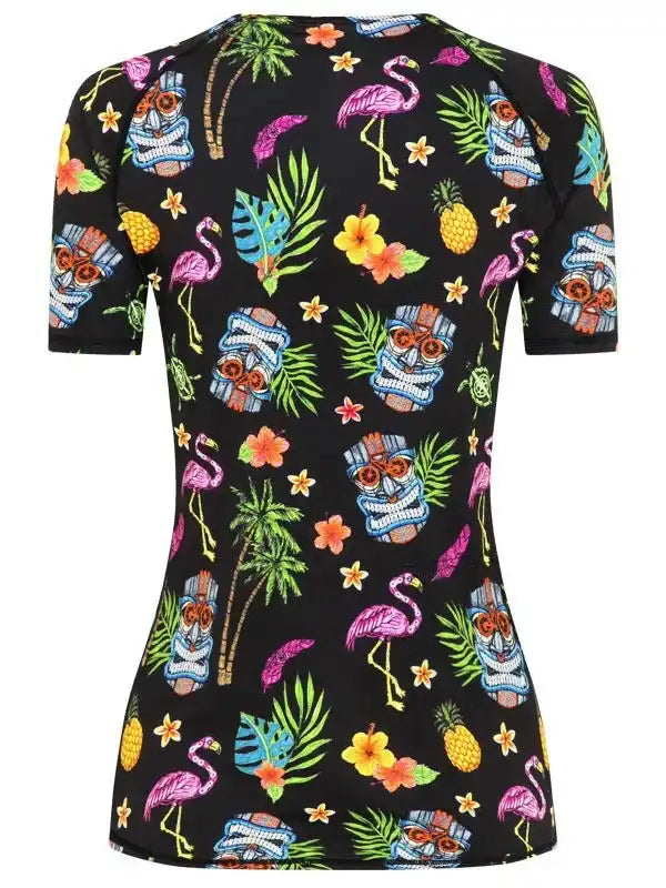 Tropical print cycling jersey with flamingos, pineapples, and tiki masks on black background