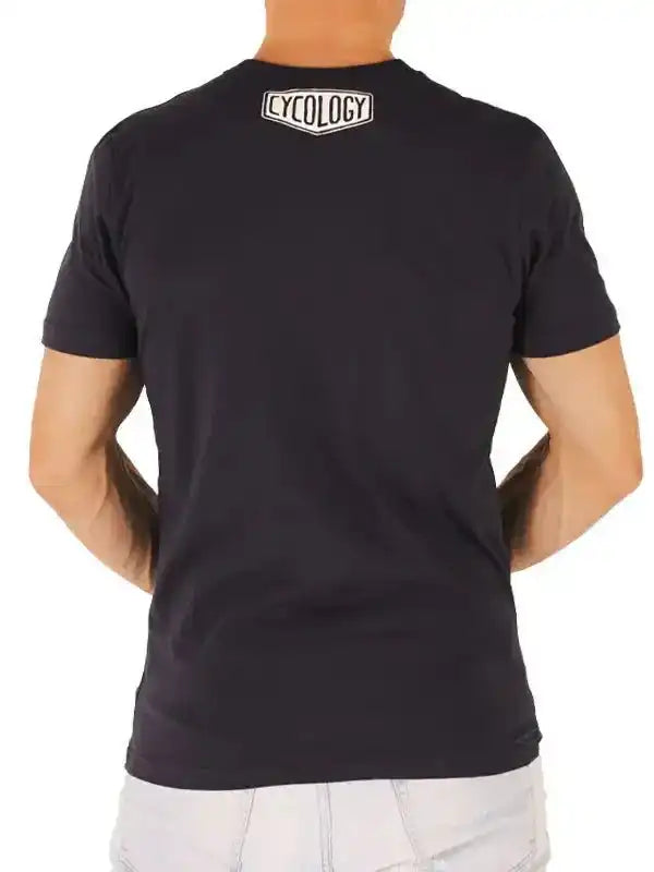 Black men's cycling t-shirt with white Cycology logo on back, casual fit for active wear