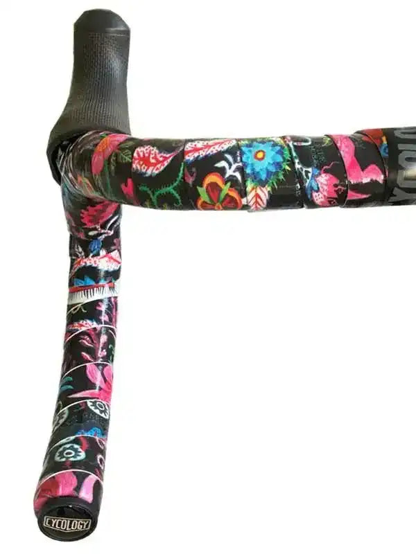 Colorful floral cycling handlebar tape with black grip, featuring vibrant patterns for road bike comfort and style.