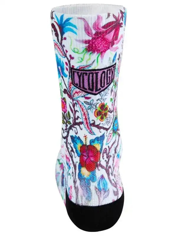 Colorful floral cycling socks with vibrant butterfly and flower print, black toe, and brand logo
