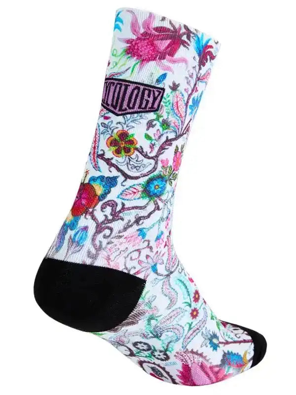 Colorful floral cycling sock with black toe and heel, featuring vibrant patterns for bike rides