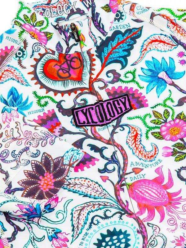 Vibrant floral and bike-themed cycling jersey with 'Cycology' patch, ideal for men's and women's rides.