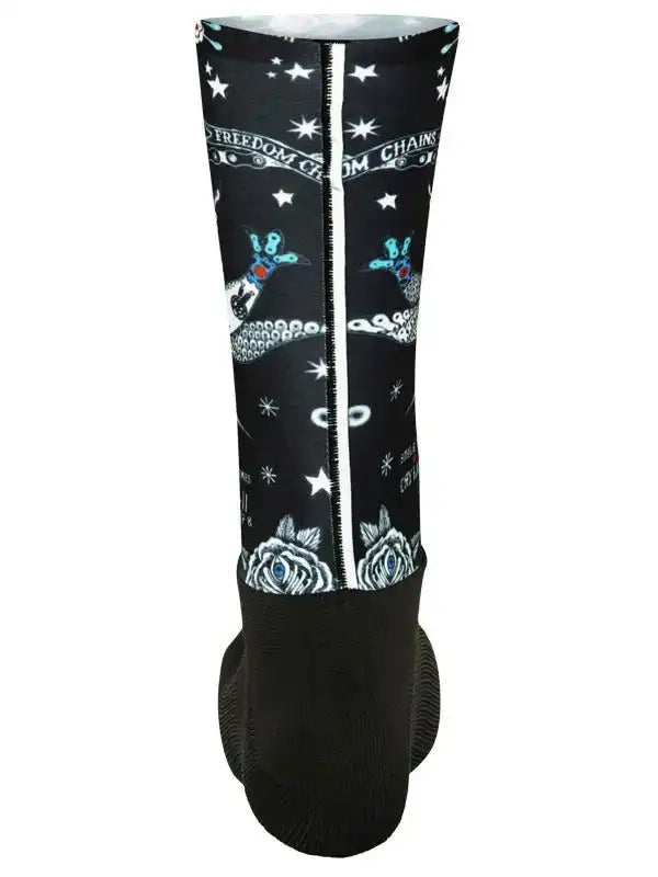 Black cycling leg warmer with stars, roses, and 'Freedom from Chains' design for men and women