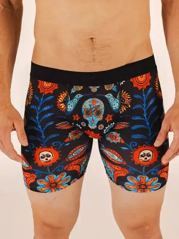 Men's cycling shorts with vibrant sugar skull and floral print design, ideal for bike rides