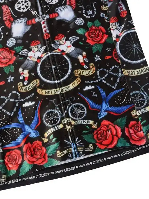 Cycling jersey with tattoo-style roses, angels, bikes, and motivational quotes on black fabric