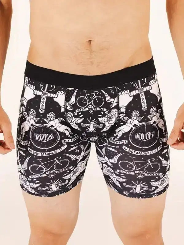 Men's cycling-themed boxer briefs with tattoo-style bike and angel graphics, black and white design