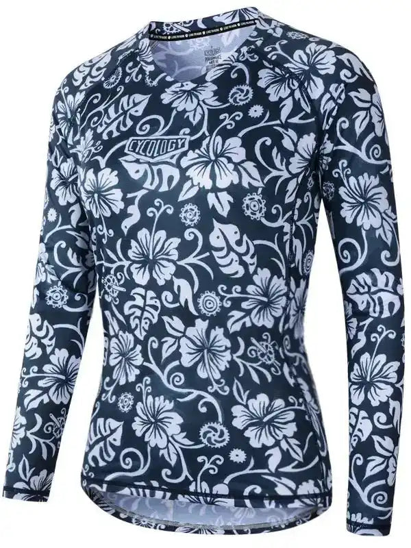 Women's long sleeve cycling jersey with white floral print on navy blue, breathable fabric