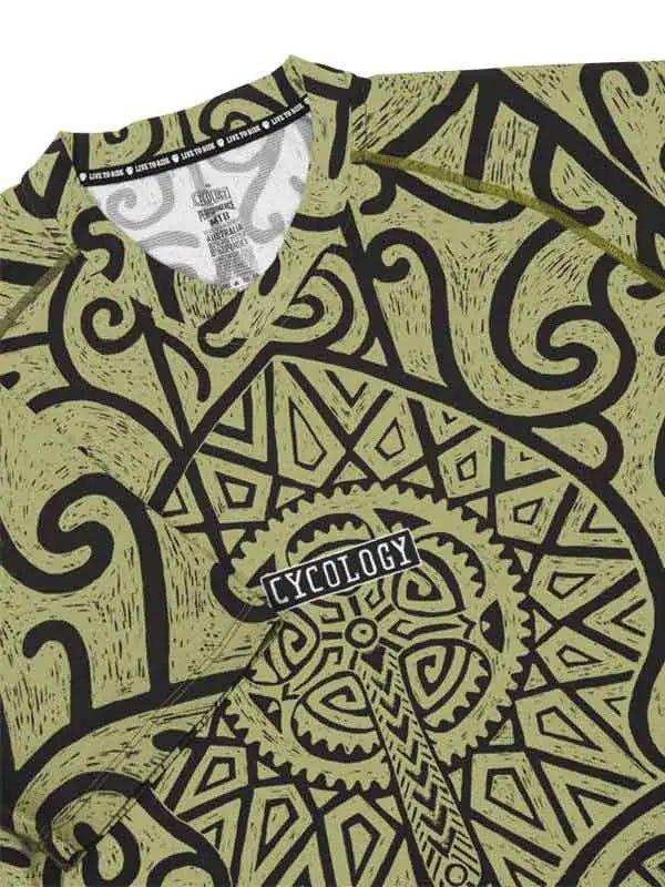 Cycology men's cycling jersey with bold tribal gear print in olive green, featuring unique design and brand logo.