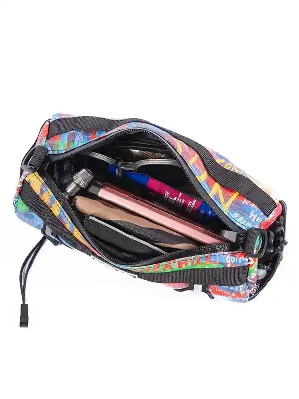Colorful cycling accessory bag with pens, phone, and tools inside, perfect for bike rides