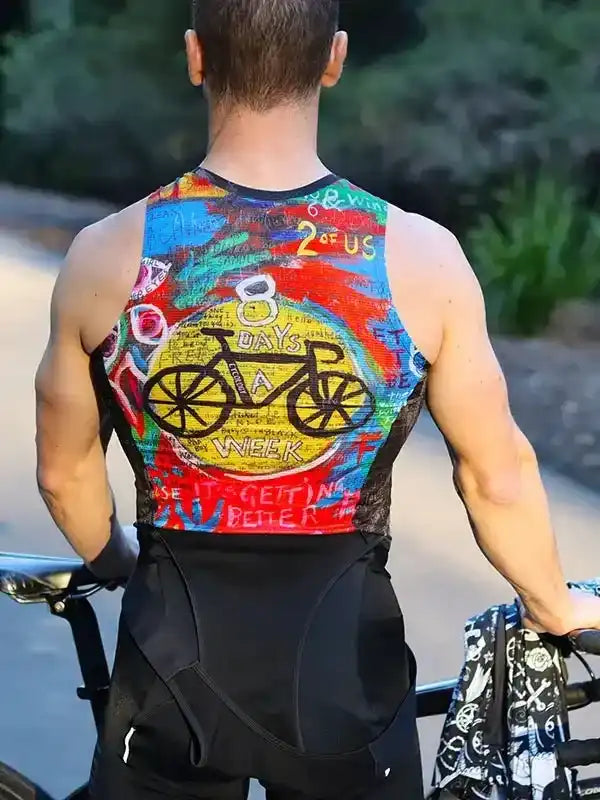 Men's cycling jersey with colorful '8 Days a Week' bike graphic, worn on trail ride