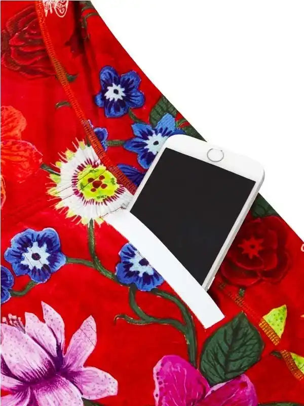 Red floral cycling jersey with phone pocket, vibrant blue and pink flowers, women's bike wear