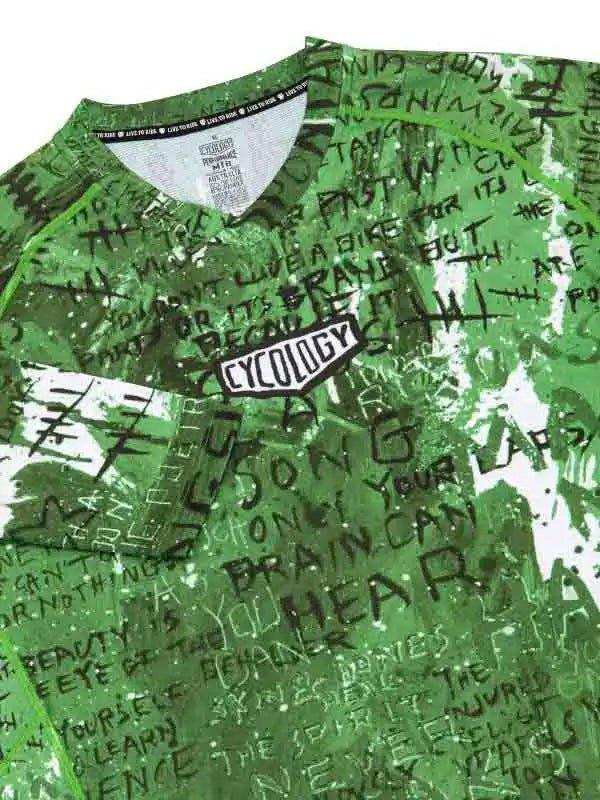 Green cycling jersey with graffiti-style text and Cycology logo, designed for men's and women's bike rides.
