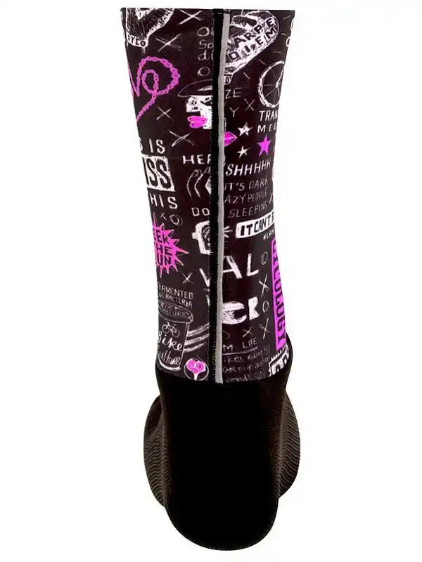 Black cycling shoe cover with pink graffiti-style graphics and text, designed for women's or unisex use.