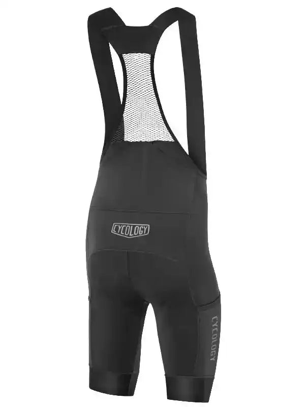Black men's cycling bib shorts with mesh back panel and Cycology branding, designed for comfort and performance.