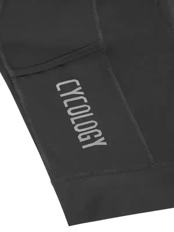 Black cycling shorts with 'CYCOLOGY' logo, high-quality fabric, men's and women's bike wear