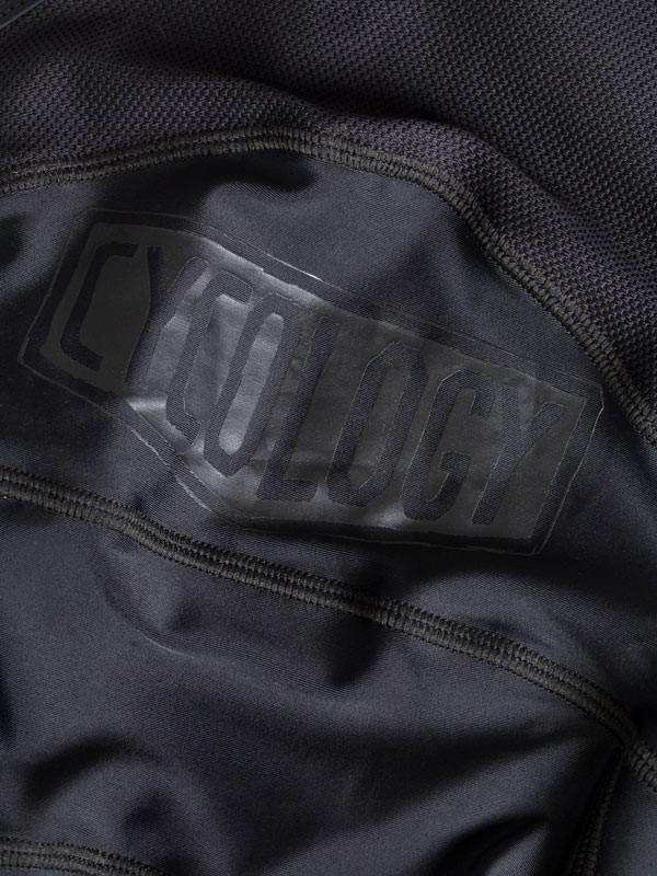 Cycology cycling jersey detail with branded logo on high-performance fabric