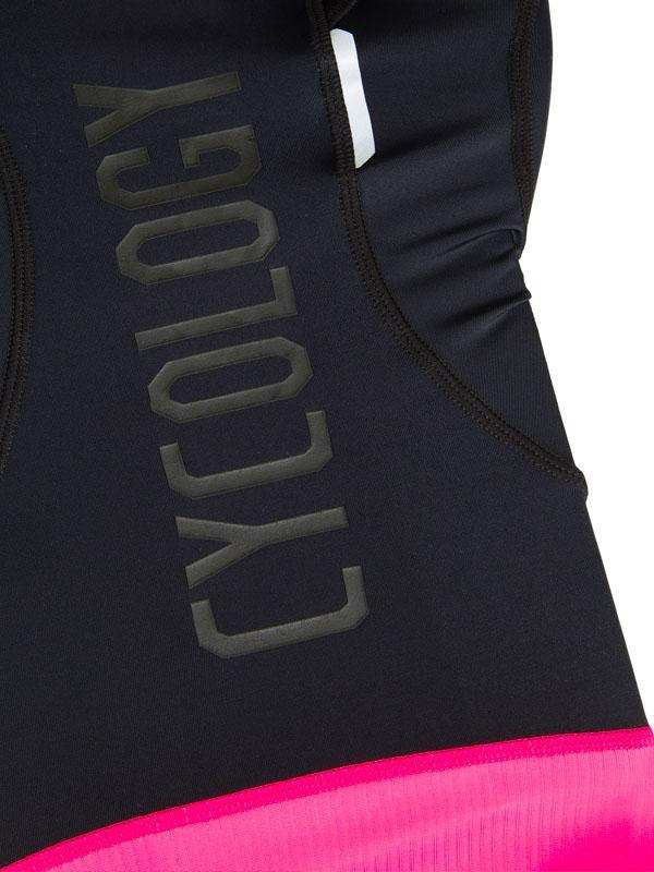 Black cycling jersey with bold 'CYCOLOGY' logo and vibrant pink hem, designed for performance and style.