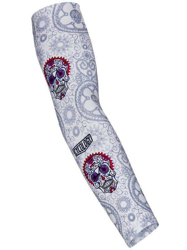 Cycling arm sleeve with sugar skull and paisley design, featuring brand logo