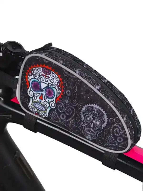 Skull-patterned cycling frame bag with vibrant sugar skull design, attached to bike top tube