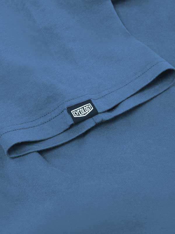 Blue cycling t-shirt with Cycology brand tag, soft fabric detail for men's and women's apparel