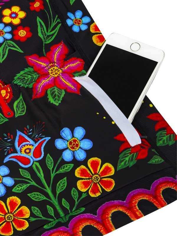 Women's cycling shorts with vibrant floral print and phone pocket, ideal for rides