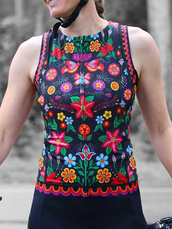 Women's floral cycling jersey with vibrant Mexican-inspired print, perfect for road biking adventures.