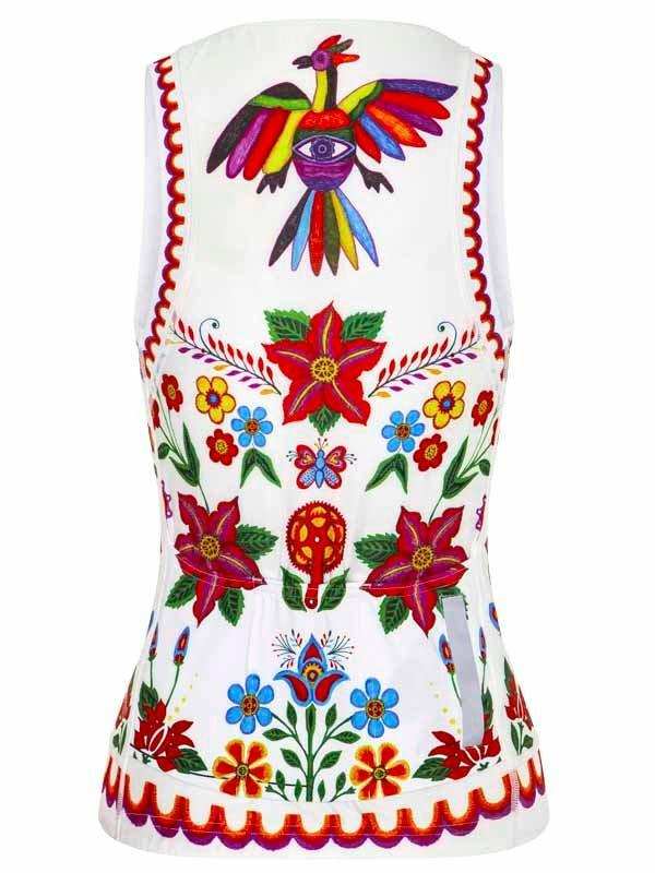 White women's cycling vest with vibrant floral and bird embroidery, colorful folk art design