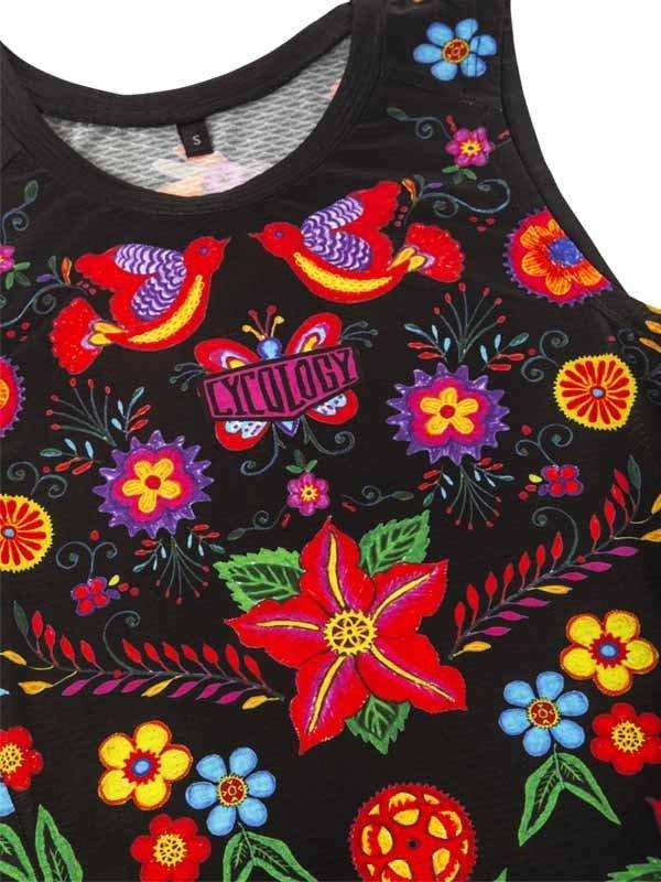 Black cycling tank top with vibrant floral and bird print, featuring colorful flowers and butterflies on dark fabric