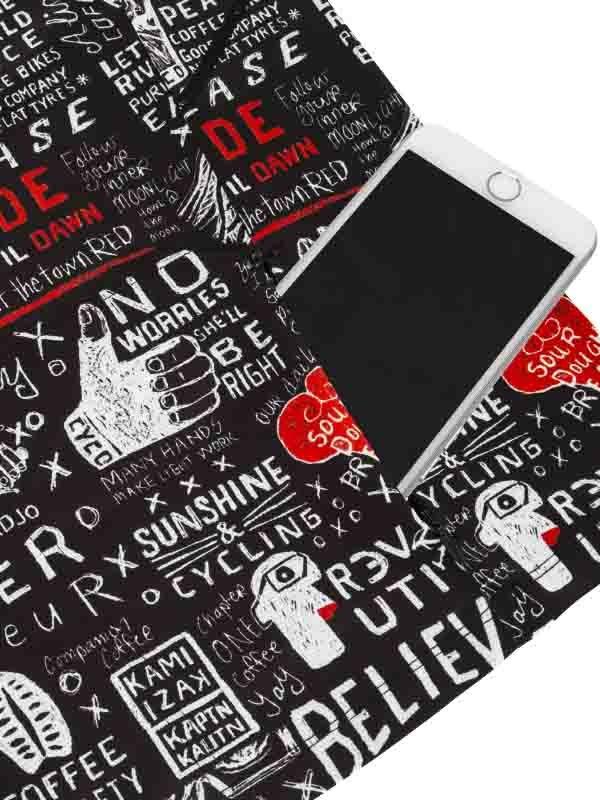 Black cycling apparel with bold white and red graphic print, featuring motivational phrases and coffee themes.