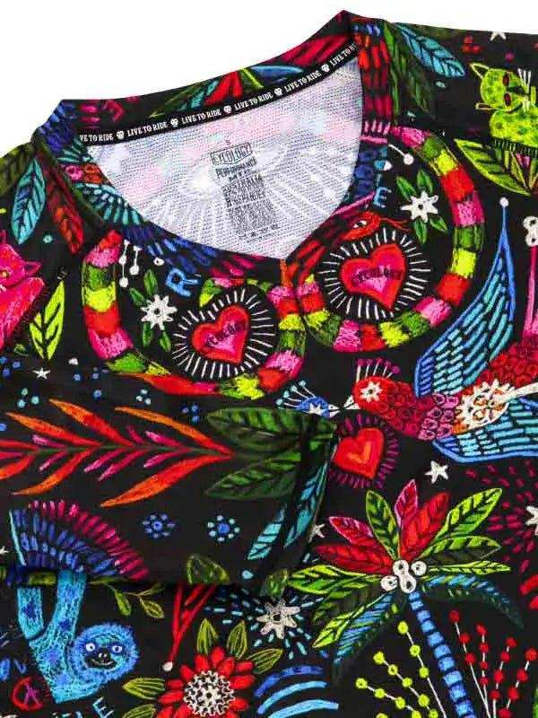 Vibrant cycling jersey with colorful hearts, birds, and floral patterns on black fabric