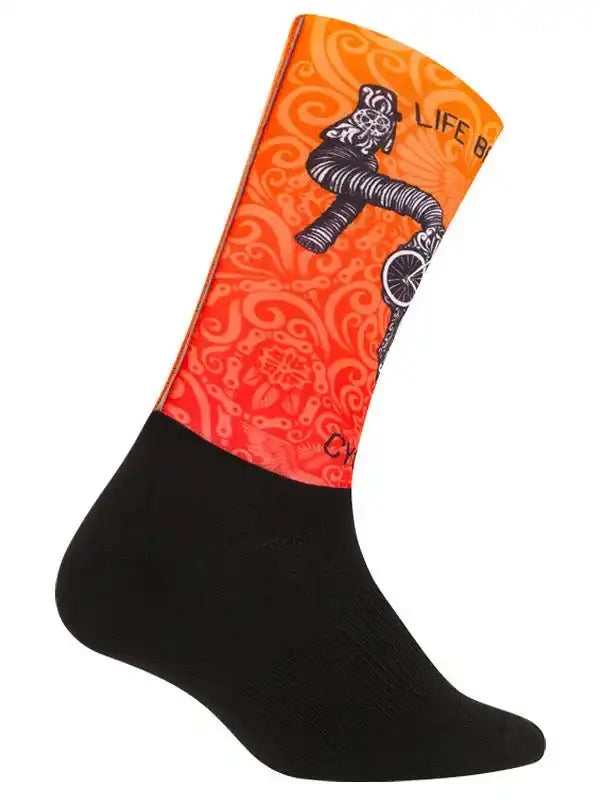 Orange cycling sock with black cyclist graphic and swirl pattern, designed for bike rides