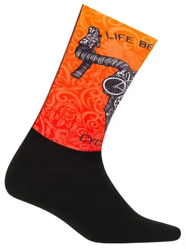 Orange cycling sock with black bike graphic and 'LIFE BE' text, designed for men and women riders.