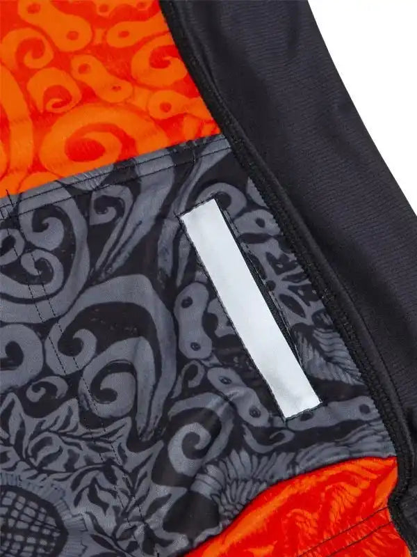 Men's cycling jersey with bold orange and gray swirl pattern, reflective strip, high-quality fabric