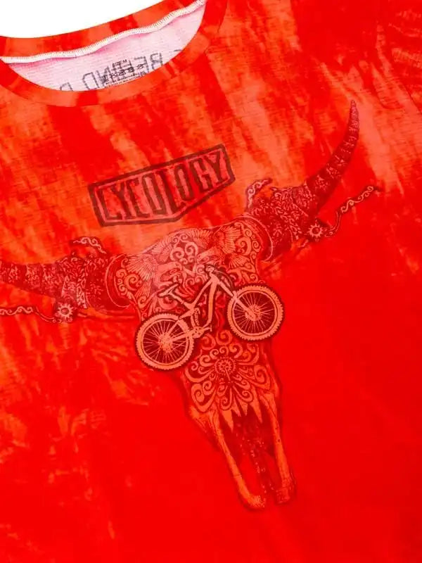 Red cycling jersey with ornate bull skull and mountain bike graphic, bold 'CYCOLOGY' logo